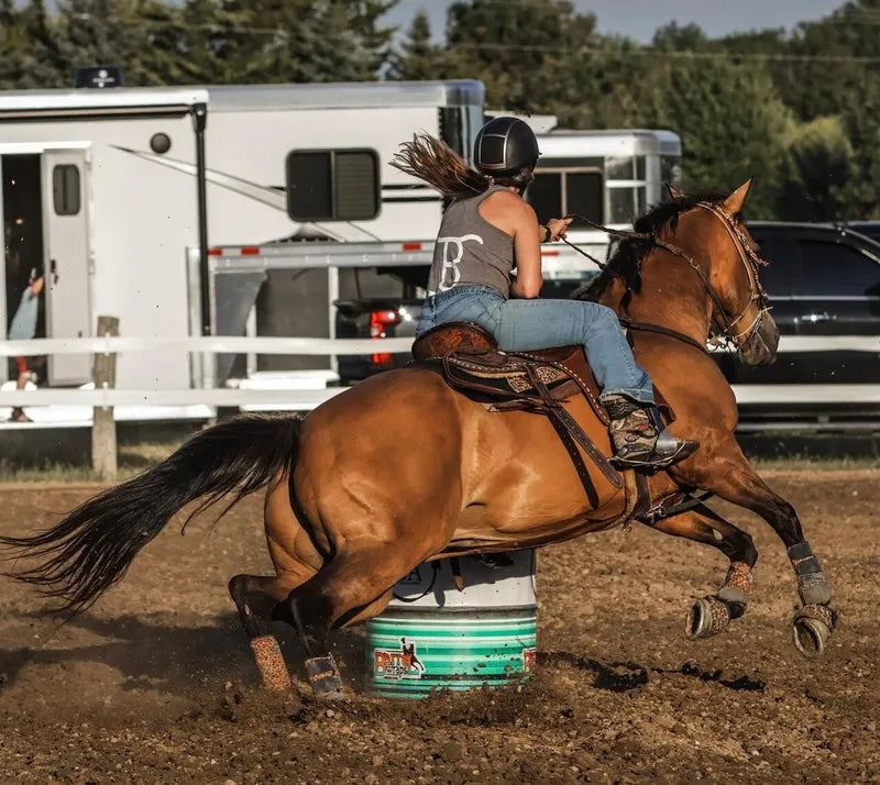 Barrel racer Bella Stanchin on bay quarter horse